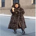 Full view of an elegant long brown faux fur hooded coat designed for winter fashion - S / Tops / Coffee