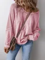 Detailaufnahme eines rosa Waffelstrick-Sweatshirts mit modischen Außennähten und Saum - S / Oberteile / Rosa