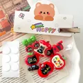 Detailed macro shot of cute apple-themed cat resin hair clips and DIY accessories. - Adhesive Set / 6个装(带卡头)