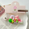 Close-up of cute mushroom house resin accessories for DIY crafts with pink handmade tag - 5 Pieces / Mushroom House Magnetic With Card