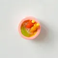 Detailed macro shot of a miniature resin dessert bowl fridge magnet with lemon slice - Strawberry Flavor Dessert Bowl Style / Light Pink