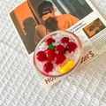 Close-up of a creative fruit fridge magnet featuring realistic red bayberries and ice cubes. - Ice Cold Waxberry Glass Bowl