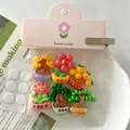 Gedetailleerde weergave van gelukkige bonsai hars bedeltjes voor DIY telefoonhoesjes en clips - Adhesive Type (HD1120) / 6个装(带卡头)