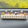 Close-up detail of cute panda car temporary parking phone number plate with fruit signs - 4 Standing Blessing Pandas / Beige