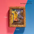Close-up of a detailed 3D miniature resin fridge magnet featuring Van Gogh's Cafe Terrace. - Cafe Terrace at Night