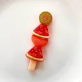 High-resolution detail of a realistic fruit skewer resin charm for DIY phone case decor - Double Watermelon Skewer