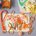 Cute colorful orange DIY keychain accessory set including star, bow, and plush charms - Colorful Bag Pendant / 10 Pieces/Pack / Orange