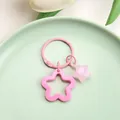 Cute pink hollow star keychain with translucent star charm variant for bag decoration - Solid Hollow Star and Jelly Star / 3cm Ring / Pink