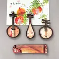 Detailansicht chinesischer Musikinstrument-Kühlschrankmagnete aus Holz wie Pipa und Guzheng - Guzheng Pipa Yueqin Zhongruan Set