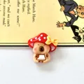 Macro view of a cute resin capybara charm with a red mushroom hat for DIY crafts - Mushroom Capybara 5