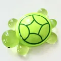 Detailed view of a translucent green resin turtle figurine with a bright lime green shell - 8.4cm*5.5cm / Large Green Turtle