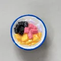 Dettaglio di un magnete da frigo in resina 3D a forma di ciotola di dessert colorato - Ciotola Blu