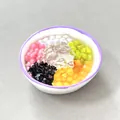 Calamita da frigo in resina 3D realistica con una ciotola di gelatina ghiacciata colorata. - Palline di Taro Colorate