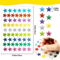 Close-up of colorful star sticker sheet with size dimensions for crafts and school - 15cmx10cm