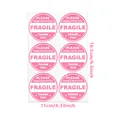 Detail view showing dimensions of pink fragile stickers for shipping and handling - Round Fragile Sticker (A136) / 16.5cm x 11cm