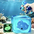 Detail showing the soft texture of luminous blue and green ocean animal squishy toys - Luminous Dolphin