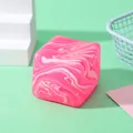 Detailed view of the marbled pink and white maltose water cube squeeze toy texture - Marbled Pink