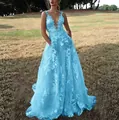 Elegant light blue lace ballgown evening dress featuring a deep V-neck and floral appliqués - Sky Blue
