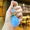 Kreativer hellblauer Zitronen-Schlüsselanhänger mit Glitzerkugel-Accessoire für Taschen - Goldene Hardware Galvanisierte Zitrone / Aurora Blau