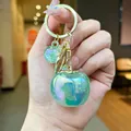 Iridescent green apple keychain charm for handbags with creative acrylic fruit design - Persimmon Style / 1 Piece / Aurora Green