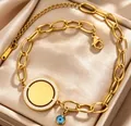 Bracciale in acciaio al titanio placcato oro 18K con ciondolo malocchio e tondo - Gold b-43g / Oro 18K