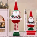 Telescopic Santa Claus doll with striped legs showing 50cm to 70cm adjustable height. - Santa Claus - Small (70cm)