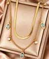 Elegant double-layer gold snake chain necklace with evil eye charms and crystals. - Evil Eye Style (N-34G)