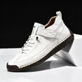 White men's mid-top casual outdoor shoes with brown hand-stitched sole and strap. - 38 / Mid-Top Martin Boots (9888) / White