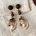 Retro wooden geometric drop earrings with iridescent shell charms in ethnic style. - Wood Bead Conch Style (28499E)