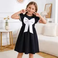 Elegantes marineblaues Mädchen-Sommerkleid mit großer weißer Zierschleife - Kleider / Schwarz / 110cm (4-5J)