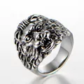 Close-up of vintage stainless steel lion head ring with punk carving details - US 7 / Steel