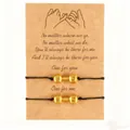 Friendship woven bracelet set with golden dumbbell charms on a pinky promise card - Dumbbell Style (HIS&HER) / Set of 2 / Black + Gold