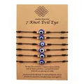 Handmade 7 knot evil eye bracelet set with blue beads presented on a kraft paper card. - Evil Eye (ZJ6971) / 6 Pieces Set