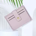Slim lavender PU leather card holder with gold snap button and card slots - Purple