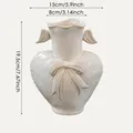 Modern heart-shaped ceramic vase with bow relief and wing handles, 19.5cm height size chart - Austali (Kraft Box) / 19.5x15x8cm