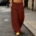 Detailed view of American street style wide-leg brown sweatpants with drawstring waist - Burgundy