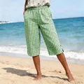 Casual green and white checkered shorts for women perfect for a beach vacation. - S / Bottoms / Green