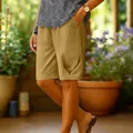 Detailed view of women's khaki cotton linen casual shorts with elastic waist and pockets - S / Bottoms / Khaki