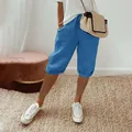 Styling of women's blue cotton linen casual cropped pants with elastic drawstring waist - S / Bottoms / Blue