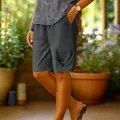 Detailed view of women's dark grey loose cotton linen shorts with elastic waist - S / Bottoms / Dark Gray