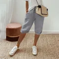 Stylish gray cotton linen casual shorts featuring elastic waist and functional pockets - S / Bottoms / Light Gray