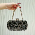 Elegante pochette da sera con strass neri e catena dorata per feste formali - Nero