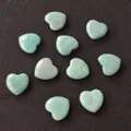 Set of ten teal natural heart-shaped polished gemstones for healing crystal decor - Amazonite