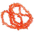 Gedetailleerd aanzicht van oranje kristalkraaltjes, ideaal voor het maken van unieke DIY sieraden. - 220 stuks/verpakking / Oranjerood Kristalsplit