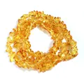 Gedetailleerd overzicht van onregelmatige gele kristallen kraaltjes voor DIY-sieraden. - 220 stuks/verpakking / Oranje Kristalsplit