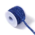 Close-up detail of blue glitter sequin braided trim ribbon cord for DIY crafts and accessories. - Sapphire Blue