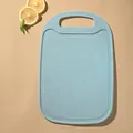 Light blue textured wheat straw cutting board with handle for kitchen fruit use - Blue