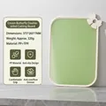 Sage green double-sided cutting board with cream butterfly detail and non-slip prep surface. - Cream Butterfly Double-Sided Board / Green