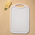 Eco-friendly wheat straw cutting board for kitchen use with handle in beige finish - Beige