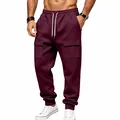 Men's burgundy drawstring cargo sweatpants with snap pockets and ribbed cuffs - S / Bottoms / Burgundy
